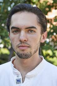 Teen thrown onto subway tracks by homeless man escapes with minor injuries 