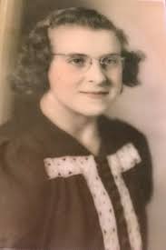 Lady stands at Crystal cliffs in Nova Scotia