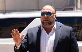 Alex Jones Files For Bankruptcy, 'Can't Afford' To Pay Sandy Hook Families  $1B