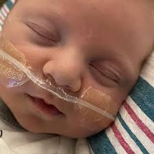 Fundraiser for Skylar Capo by Alison Wright : Skylar and Logan Schofield  with baby Silas