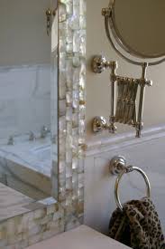 You can make your own decorative frames. Cream Brick Pearl Shell Tile Bathroom Mirror Frame Diy Bathroom Decor Mother Of Pearl Tiles
