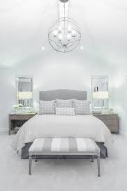 We offer upholstered end of bed storage benches at sale prices. Gray Camelback Headboard With Striped Gray Bedroom Bench Transitional Bedroom