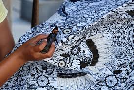 Ia adalah budayawan yang tertarik pada batik, keris, dan tari. Batik Go Tik Swan Whiteboard Journal