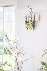 The flower bunches will need to be hanging out of direct. How To Make A Charming Dried Flower Wall Hanging For Your Home