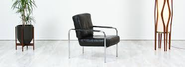 Gorgeous pair of minimalist danish club chairs, sleek lines, extreme comfort and supple black leather! Danish Modern L A Mid Century Adjustable Chrome Leather Lounge Chair