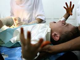 A boy inhales and exhales as a doctor listens with a stethoscope. Doctor Accidentally Cut Off Boy S Penis During Circumcision Procedure The Independent The Independent