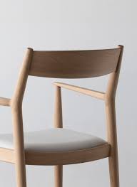 The Accompanying Dining Chair Was Made Using Existing Timber Parts Found In The 13 000 Square Metre Karimoku Japanese Furniture Danish Dining Chairs Furniture