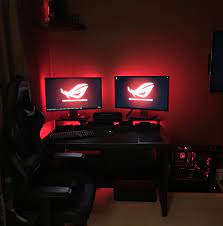The black and white texture is perfectly presented here with blue on the top and magenta on the bottom of the. Black Red Room Setup Gaming Room Setup Game Room Design