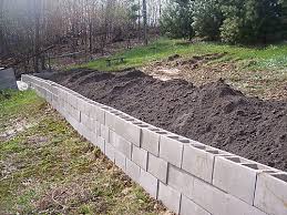 (via the garden glove) 4. Pin By Kathy Foster On Retaining Wall Ideas Landscaping Retaining Walls Garden Retaining Wall Cheap Retaining Wall