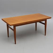 The standard coffee table height is between 16 and 18, however, we recommend choosing a coffee table height that pairs well with your sofa. Coffee Table Teak Height Adjustable Mid 1900s Furniture Tables Auctionet