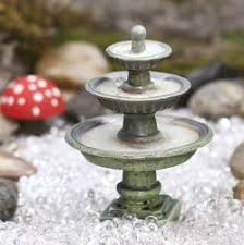Combines waterfall sounds & intimate lighting this small indoor fountain creates a relaxing ambient by combining natural water sounds and intimate lighting provided by the tealight candles. Miniature Water Fountain Fairy Garden Supplies Craft Supplies Factory Direct Craft