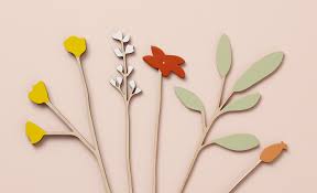 Chunky wooden hand painted pastel coloured flowers with raffia ties. Buttercup Sage Set Anna Wiscombe