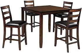 No damage from truck or delivery. Ashley Furniture Signature Design Coviar Counter Height Dining Room Table And Bar Stools Set Of 5 Brown Amazon Ca Home Kitchen