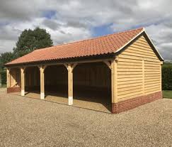 Bespoke oak carports built to last. Oak Framed Garages And Timber Outbuildings