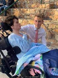 Boy takes girl with special needs to prom