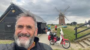 When I first took up cycling, some 70 years ago: Me flipping the bird to  anyone who doubted I could win the Tour de France!