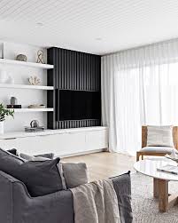 Sleek American Oak Batten Detail Tv Wall Finished In Black Stain By Uneekinteriorsolutions In 2020 Living Room Tv Living Room Tv Wall House Interior