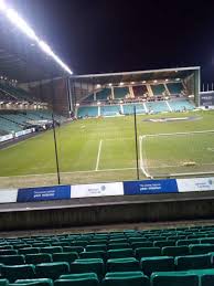 It's around ten miles from the ground or nine miles from the city centre and there are trams and buses you can take. Photos At Easter Road Stadium