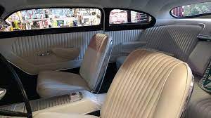 Simply Amazing Custom Merc Interior In Pleated Tuck N Roll White And Low Back Bucket Seats Interior Seating Car Seats