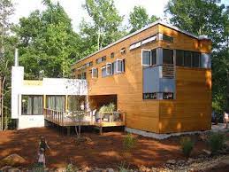 With 2 400 Sf Divided Among Five Prefabricated Modules The Home Offers Compact And Efficient Quarters Made Up Of Larg Prefab Homes Prefabricated Houses Prefab