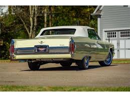 Image result for Cape Ivory 1966 Cadillac