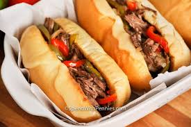 Spray your crock pot with pam cut the beef round steak into thin slices and brown just a minute in a pan add green pepper, onion, stock, garlic salt, pepper and dressing mix to the crock pot and cover cook on low for 8 hours Crockpot Philly Cheesesteak Sandwiches Spend With Pennies