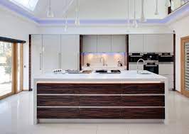 Metal accents like the backsplash, table and chairs add contrast and modern touches. 14 Macassar Ebony Ideas Contemporary Kitchen Interior Ebony
