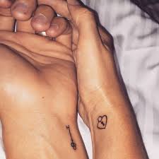 This might be the way they find their way back to each other. Matching Lock And Key Tattoos For Couples