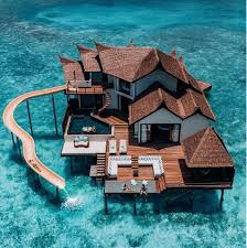 For newly constructed swimming pools this is one of the most common interior surfaces. Jumeirah Vittavelli Resort S Villas Feature Massive Slides Jumeirah Vittavelli Maldives Vacation