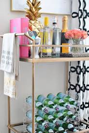 Bar carts are beautiful, useful and can be a real focal point for any party but they can also be an but i feel that currently, they have taken on a more versatile and decorative role. How To Decorate A Bar Cart Chronicles Of Frivolity