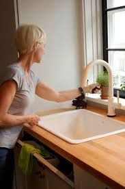 how to install a sink tip out tray for
