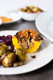 Thanksgiving Stuffed Vegan Delicata Squash This Easy Stuffed Squash Is The Perfect Vegetarian Thanksgiving Recipes Vegan Holiday Recipes Vegan Dinner Recipes