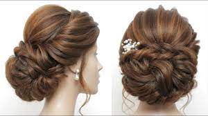 Curly braided hair a is very trendy spring wedding hairstyles. New Low Messy Bun Bridal Hairstyle For Long Hair Wedding Updo Tutorial Youtube