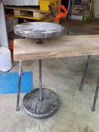 We've wanted a potter's wheel for sometime but couldn't justify dropping a thousand dollars for a the table top is mdf scavenged from the treadmill. I Made My Own Foot Kick Potter S Wheel Using 3cm Black Granite For The Wheels Pottery Wheel Diy Slab Pottery Diy Pottery