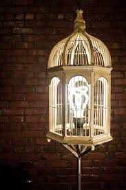 Bird Cage Floor Lamp Bird Cage Floor Lamp By Joel Seigle Plumen Light Bulb Found Bird Cage Welded Frame With Images Caged Lamp Lamp Decor Light Bulb Design