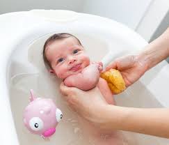 Cute little boy is bundled up and receiving a sponge bath by a nurse in his hospital room. 621 Baby First Bath Photos Free Royalty Free Stock Photos From Dreamstime