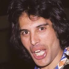 How many extra teeth did Freddie Mercury have?