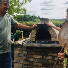 Using shutter board or 114 x 38 pine sections, construct a box with inside dimensions of 1420 mm x 1370 mm (1420 mm is the width of the front end of the oven). We Built A Clay Oven That Cooks A Pizza In 60 Seconds