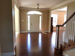 There's a small balcony overlook which (although difficult to photograph), gives an overall a grand impression. Foyer Living Dining Room Reveal