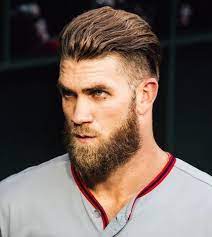 Notice the small ponytail flaunted by bryce harper after slicking back the medium length hair to the back. The Bryce Harper Haircut Steeltooth