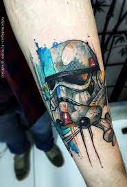 The storm trooper tattoo by math evenmoreblack is the tattoo design as dark as the whole empire intentions are. Colorful Stormtrooper Helmet Tattoo On Left Forearm