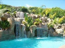 This With An Underground Pool House Behind The Waterfall And The Jacuzzi Up Top By Where The Slide Pool Waterfall Backyard Pool Landscaping Pool Landscaping