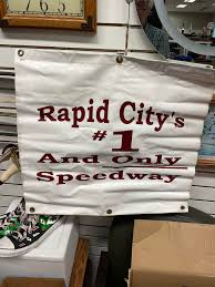 That's Black Hills Speedway Hall of Fame member Sam Liebig with son Shane  Liebig Motorsports car at Husets Speedway after driver Scott Bogucki scored  a heat race win Sunday June 9th. |