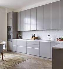 We have white corian worktops and cupboard fronts. Ikea Kitchen Grey Home And Aplliances