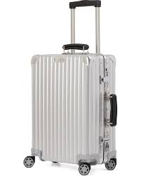 Each airbaltic passenger is allowed to take aboard at least one piece of cabin baggage, depending on the service class. Rimowa Leather Classic Check In M Luggage In Silver Metallic Lyst
