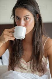 The best gifs are on giphy. Woman Drinking Coffee In Bed Stock Photo Dissolve