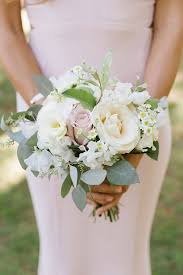 A spring wedding bouquet with pink blooms and pale greenery and some blooming branches for a texture. Soft Romantic Summer Wedding Florals Bridal Bouquet Summer Wedding Bridesmaid Bouquets Bridesmaid Bouquet