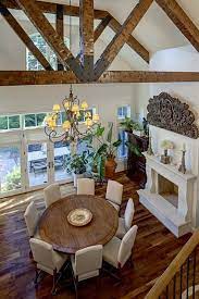 Round Dining Tables Ideas Tips Artisan Crafted Iron Furnishings And Decor Blog Round Dining Room Table Round Dining Room Large Round Dining Table