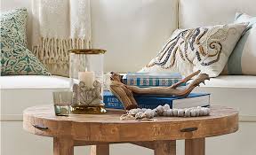 Funky stacked book table makeover refreshed with white paint. How To Choose Amazing Coffee Table Books Pottery Barn