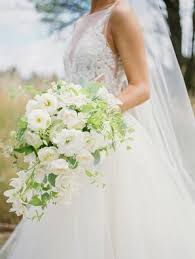 The beautiful couple exchanged the marital vows at the beach in the presence of friends and family members. Gardenia Wedding Flower Arrangements